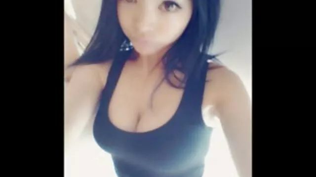 A young Japanese woman lies in bed with her legs spread and blanche neige film porno watches the phallus